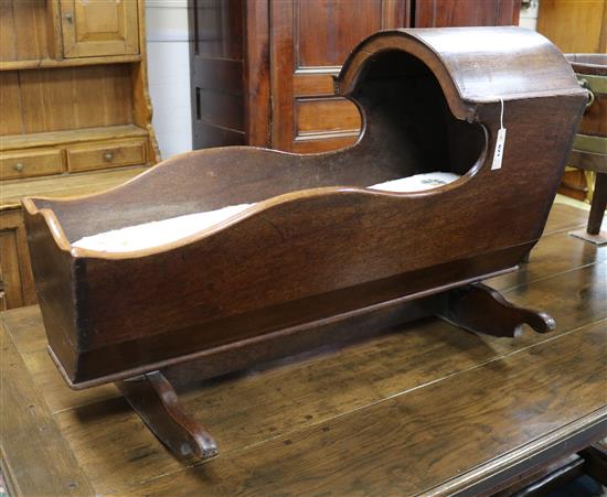 A 19th century mahogany cradle W.99cm